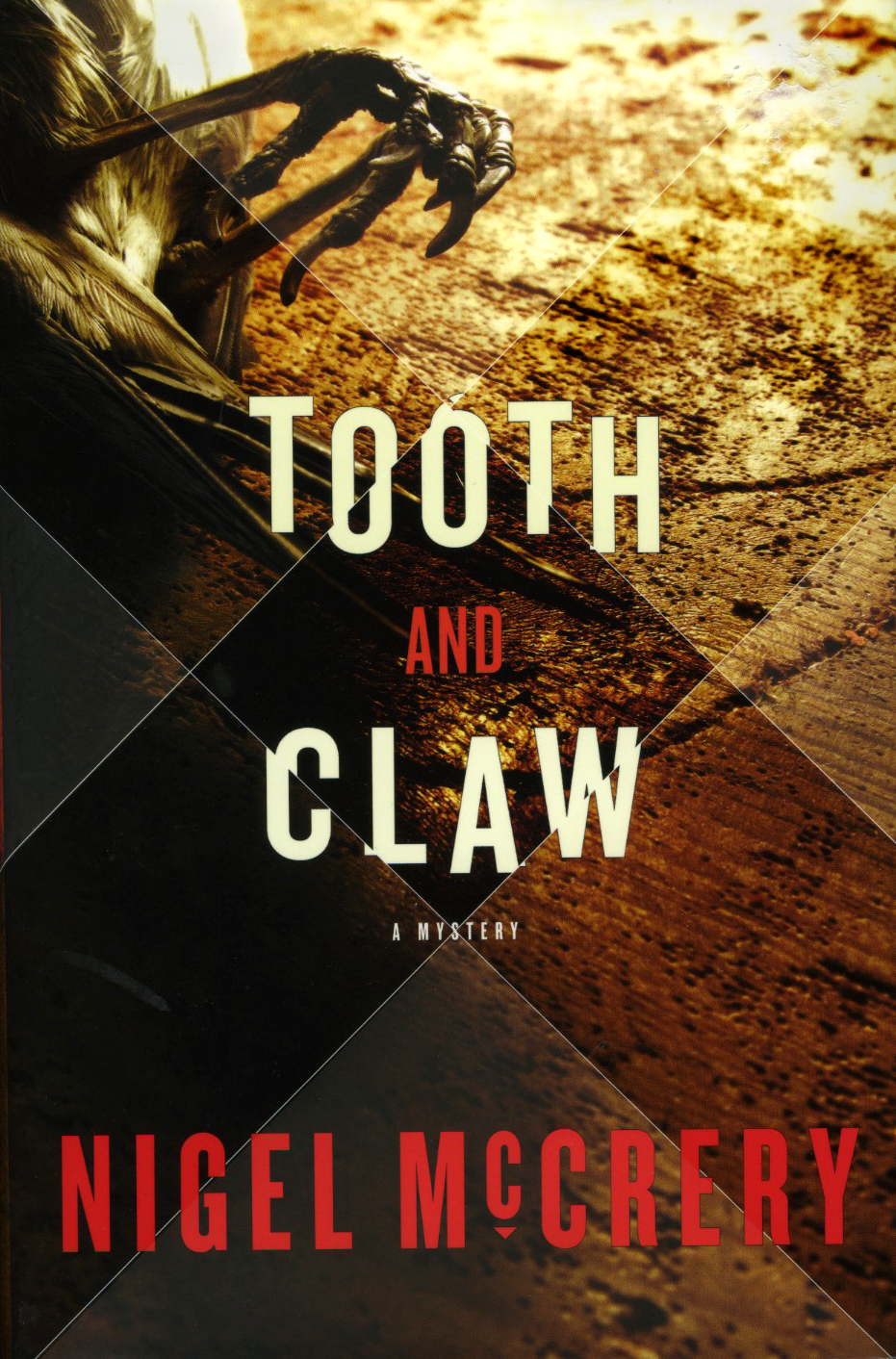Tooth and Claw, by Nigel McCreryPhotograph by Jessica Hines, cover design by Brian Barth, Random House Books